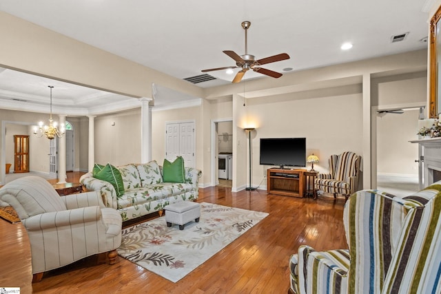 27 Grossmont Dr, Fountain Inn, SC 28644 - living room with ceiling fan, hardwood / wood-style flooring, ornamental molding, a chandelier, and baseboards