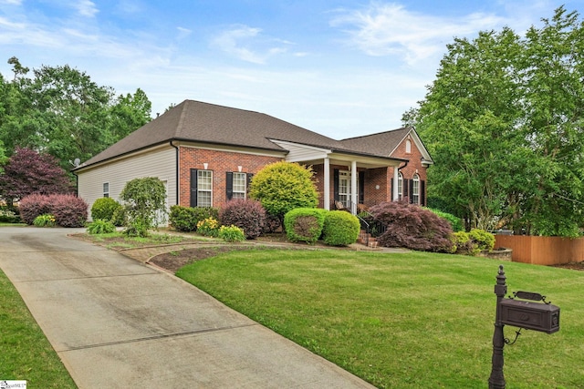 27 Grossmont Dr, Fountain Inn, SC 28644 - view of front facade with brick siding, roof with shingles, and concrete driveway