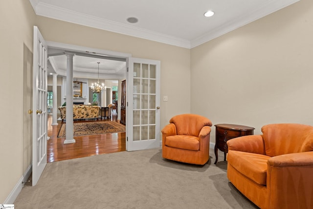 27 Grossmont Dr, Fountain Inn, SC 28644 - sitting room with decorative columns, french doors, crown molding, carpet flooring, and baseboards