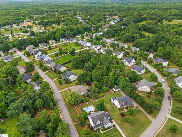 27 Grossmont Dr, Fountain Inn, SC 28644 - aerial view of property and surrounding area featuring nearby suburban area and a heavily wooded area