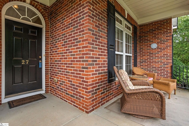 27 Grossmont Dr, Fountain Inn, SC 28644 - doorway to property featuring covered porch and brick siding