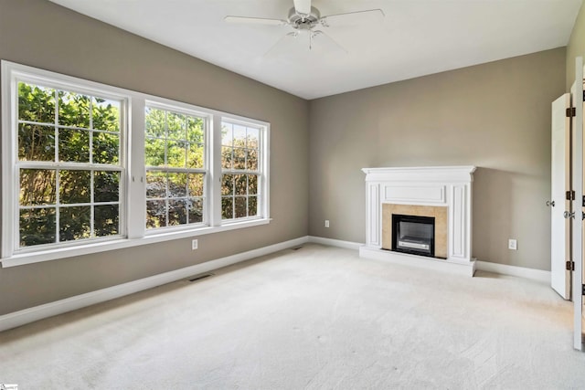1073 Corie Crest Dr, Boiling Springs, SC 29316 - unfurnished living room with healthy amount of natural light, baseboards, carpet, and a ceiling fan