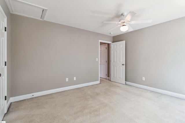 1073 Corie Crest Dr, Boiling Springs, SC 29316 - empty room featuring light colored carpet, ceiling fan, baseboards, and attic access