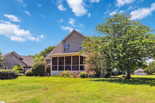 1073 Corie Crest Dr, Boiling Springs, SC 29316 - rear view of house with a sunroom and a lawn