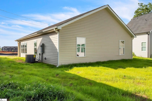 182 Ridge St, Spartanburg, SC 29302 - view of side of home with central AC and a lawn