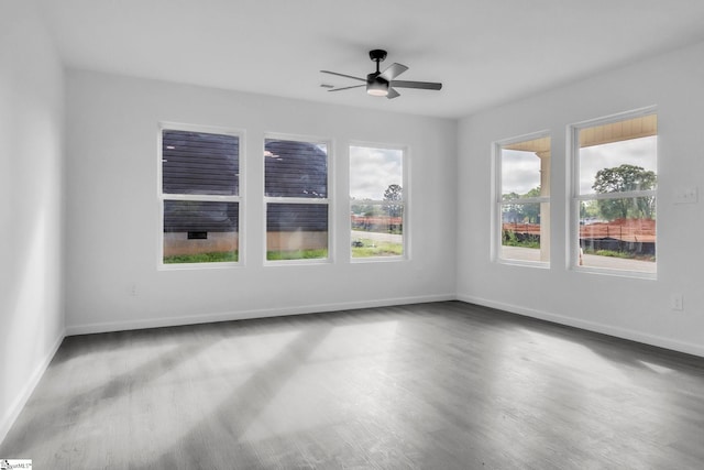 182 Ridge St, Spartanburg, SC 29302 - spare room featuring a ceiling fan, baseboards, and wood finished floors