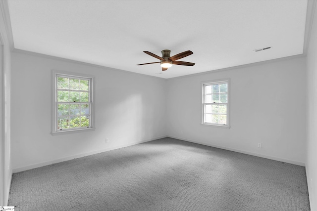 302 Spruce St, Clinton, SC 29325 - carpeted empty room with healthy amount of natural light, a ceiling fan, and baseboards