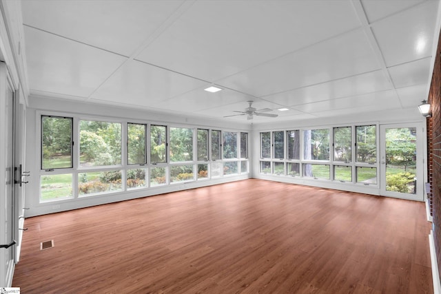 302 Spruce St, Clinton, SC 29325 - unfurnished sunroom with wood finished floors, a wooden deck, and recessed lighting