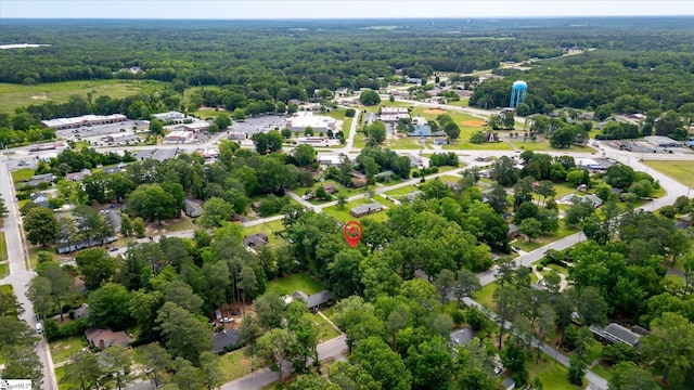 302 Spruce St, Clinton, SC 29325 - aerial view of property and surrounding area featuring a forest