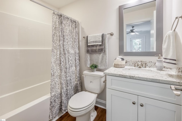 101 Poplar Ave, Belton, SC 29627 - full bath with toilet, vanity, wood finished floors, shower / tub combo, and a ceiling fan