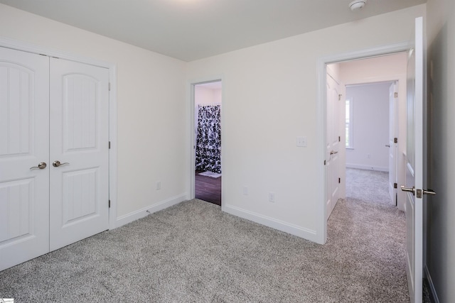 101 Poplar Ave, Belton, SC 29627 - unfurnished bedroom with carpet flooring, baseboards, and a closet