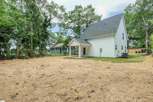 101 Poplar Ave, Belton, SC 29627 - rear view of house with a shingled roof, central air condition unit, and a patio
