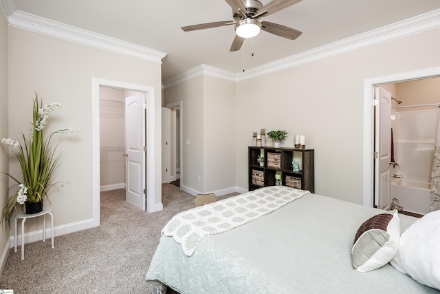 106 N St, Belton, SC 29627 - bedroom featuring ornamental molding, a spacious closet, light colored carpet, baseboards, and connected bathroom