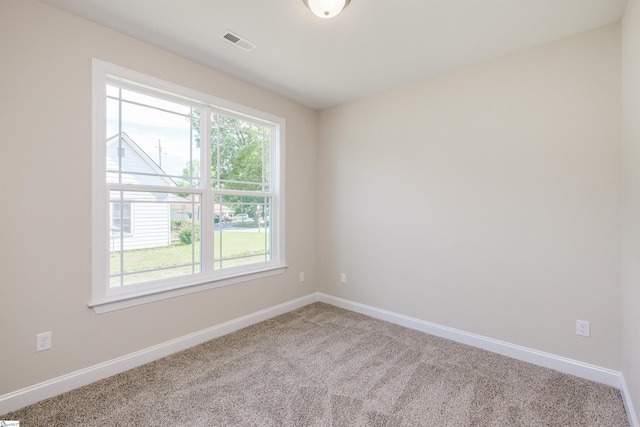 106 N St, Belton, SC 29627 - carpeted spare room with baseboards