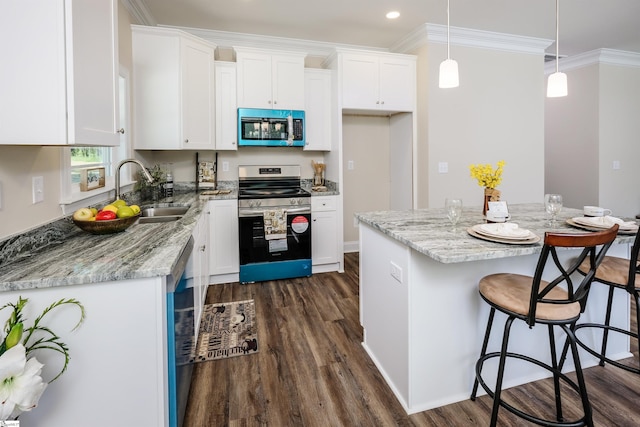 106 N St, Belton, SC 29627 - kitchen with appliances with stainless steel finishes, a sink, white cabinets, dark wood-style flooring, and crown molding