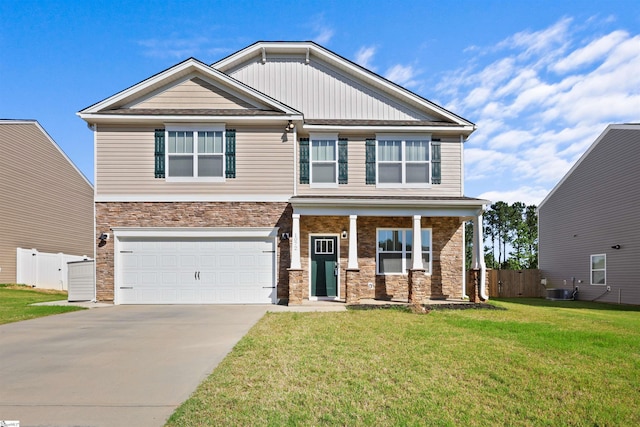 1072 Longstone Way, Spartanburg, SC 29306 - craftsman house featuring an attached garage, concrete driveway, stone siding, and central AC unit