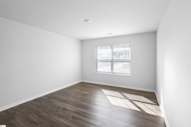 1072 Longstone Way, Spartanburg, SC 29306 - unfurnished room featuring baseboards and dark wood-style floors