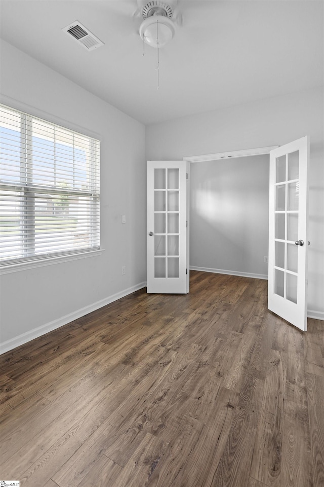 1072 Longstone Way, Spartanburg, SC 29306 - unfurnished room featuring french doors, dark wood-style flooring, baseboards, and a ceiling fan