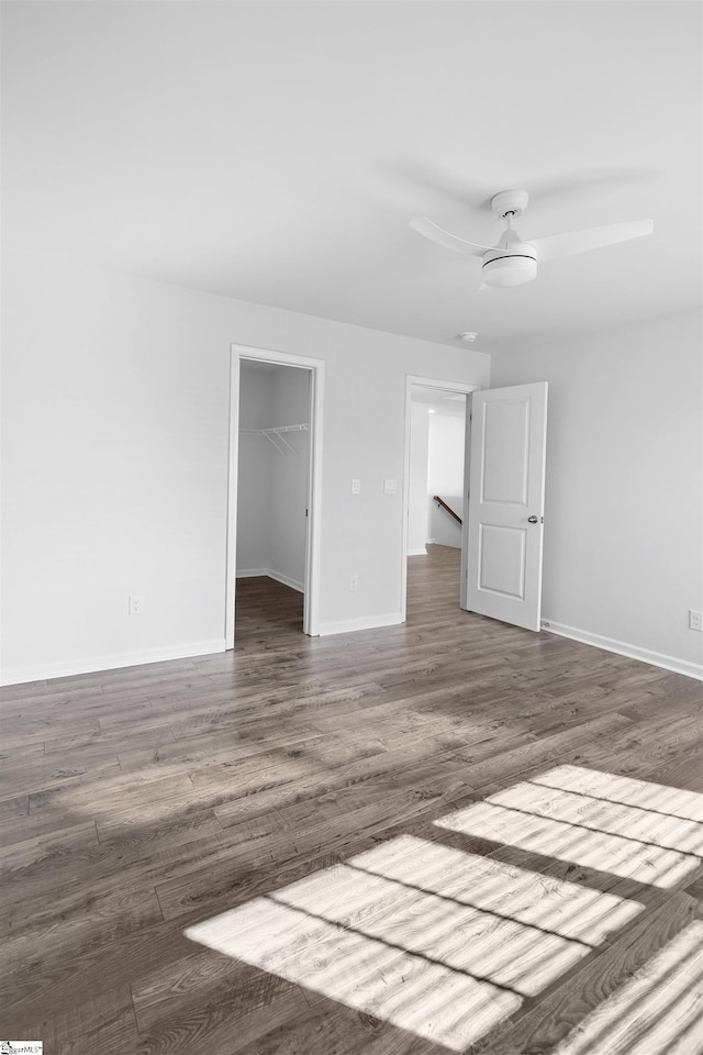 1072 Longstone Way, Spartanburg, SC 29306 - spare room featuring wood finished floors, ceiling fan, and baseboards