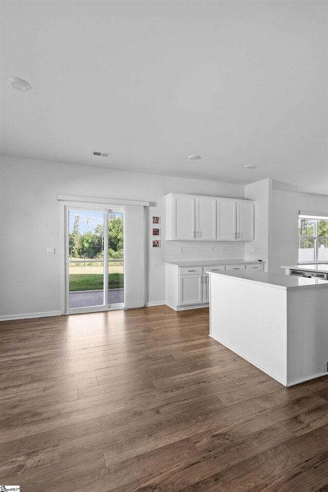 1072 Longstone Way, Spartanburg, SC 29306 - unfurnished living room with dark wood-type flooring and baseboards