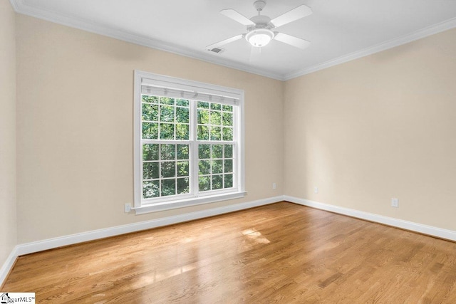 67 Devonhall Way, Taylors, SC 29687 - empty room featuring healthy amount of natural light, wood finished floors, ornamental molding, and baseboards