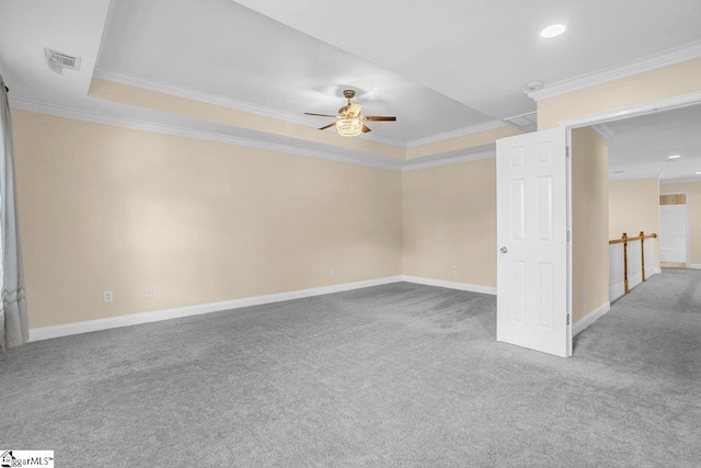 67 Devonhall Way, Taylors, SC 29687 - spare room with crown molding, a ceiling fan, carpet, baseboards, and a raised ceiling