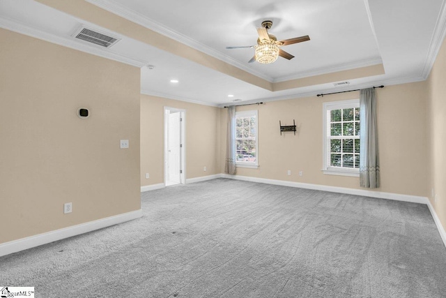 67 Devonhall Way, Taylors, SC 29687 - empty room with crown molding, a ceiling fan, a tray ceiling, carpet flooring, and baseboards