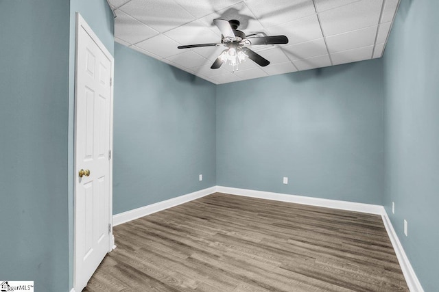 67 Devonhall Way, Taylors, SC 29687 - empty room with a ceiling fan, a paneled ceiling, wood finished floors, and baseboards
