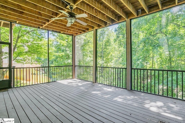 67 Devonhall Way, Taylors, SC 29687 - unfurnished sunroom with a ceiling fan, a relaxing sauna, and view of scattered trees