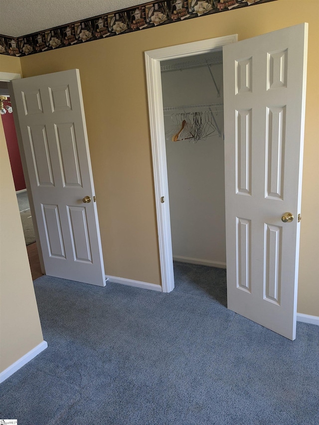 7 Willow Wood Ct, Taylors, SC 29687 - unfurnished bedroom with carpet flooring, baseboards, and a closet