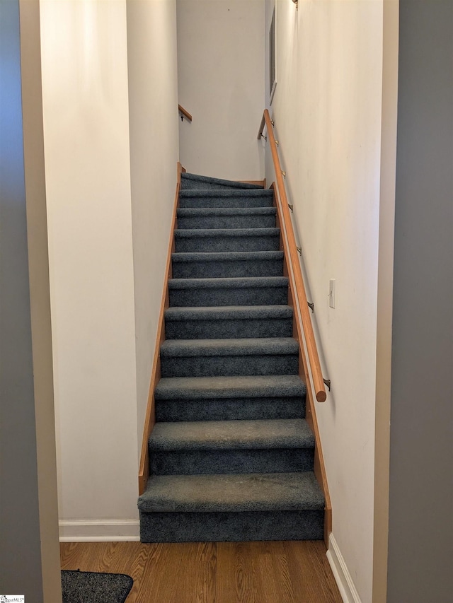 7 Willow Wood Ct, Taylors, SC 29687 - stairway with wood finished floors and baseboards
