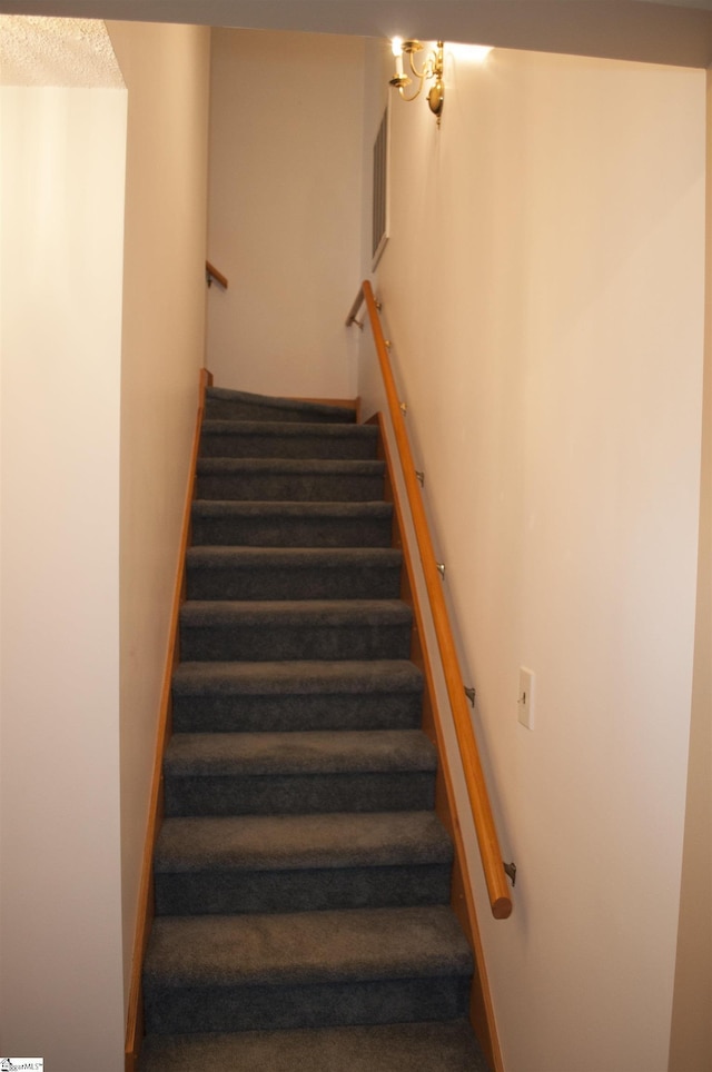 7 Willow Wood Ct, Taylors, SC 29687 - staircase featuring baseboards