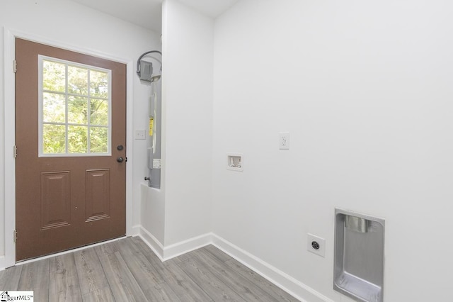 1008 Tribble St, Anderson, SC 29625 - washroom with electric dryer hookup, light wood-type flooring, hookup for a washing machine, and baseboards