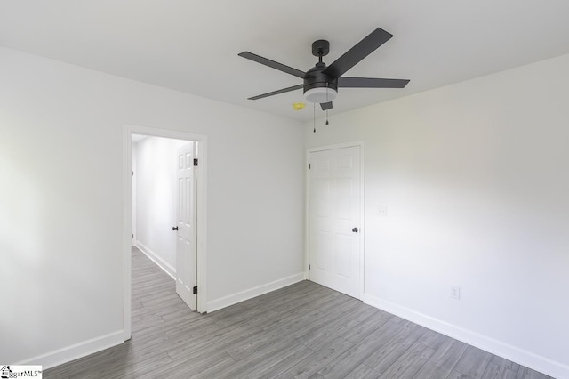 1008 Tribble St, Anderson, SC 29625 - unfurnished room with wood finished floors, baseboards, and a ceiling fan