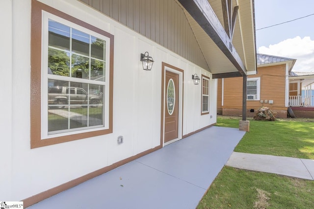 1008 Tribble St, Anderson, SC 29625 - view of exterior entry featuring a lawn and covered porch
