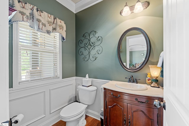 100 Claiborne Rd, Piedmont, SC 29673 - bathroom with crown molding, toilet, vanity, wainscoting, and wood finished floors