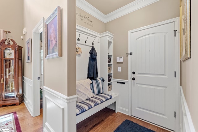 100 Claiborne Rd, Piedmont, SC 29673 - mudroom with ornamental molding, light wood-style floors, a wainscoted wall, and a decorative wall