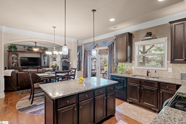 100 Claiborne Rd, Piedmont, SC 29673 - kitchen featuring dishwasher, a sink, dark brown cabinetry, a chandelier, and light wood-style floors