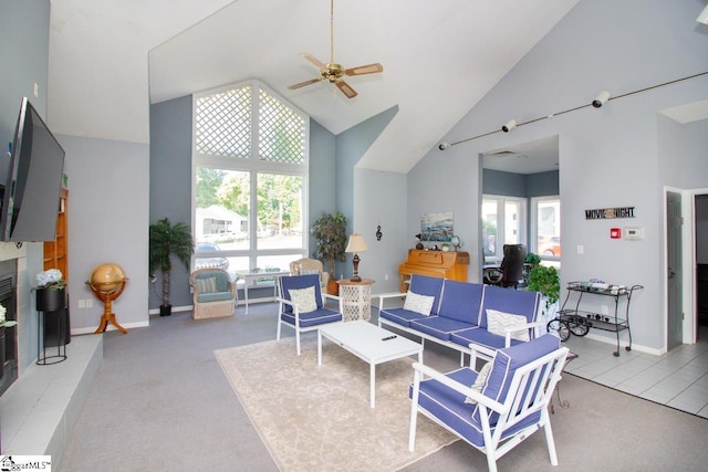 1507 Northlake Dr, Anderson, SC 29625 - living area with high vaulted ceiling, ceiling fan, light colored carpet, and baseboards