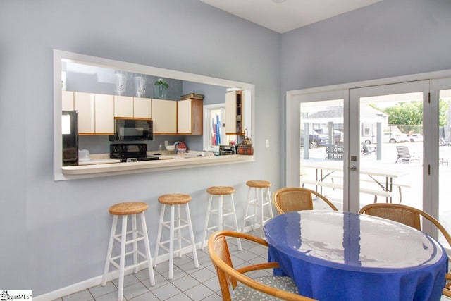 1507 Northlake Dr, Anderson, SC 29625 - dining room featuring light tile patterned flooring and baseboards
