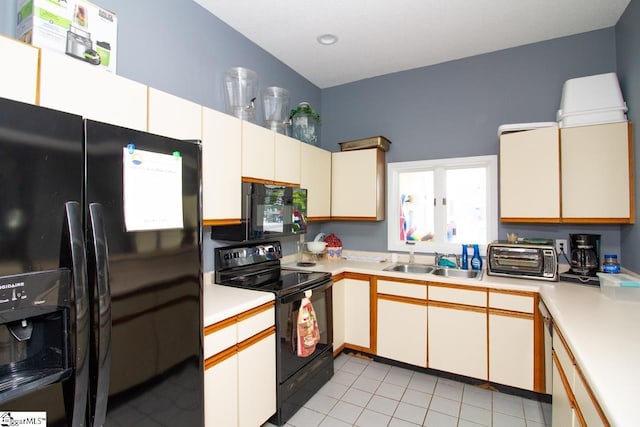 1507 Northlake Dr, Anderson, SC 29625 - kitchen with black appliances, a sink, light countertops, light tile patterned flooring, and recessed lighting