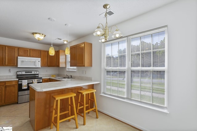 103 Berry Ct, Belton, SC 29627 - kitchen featuring electric range, white microwave, a sink, light countertops, and light tile patterned floors