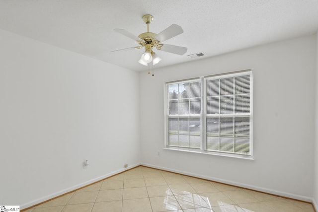 103 Berry Ct, Belton, SC 29627 - unfurnished room featuring light tile patterned flooring, ceiling fan, and baseboards