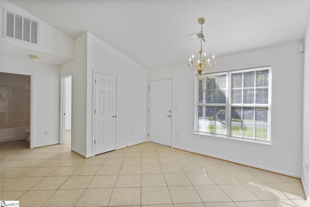 103 Berry Ct, Belton, SC 29627 - unfurnished dining area featuring a chandelier, baseboards, and light tile patterned flooring