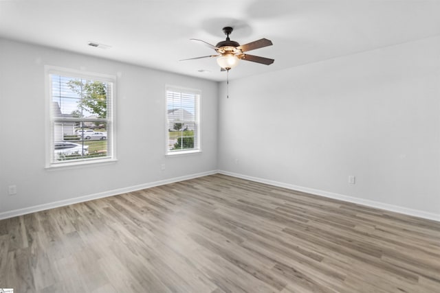9023 Germaine Ct, Boiling Springs, SC 29316 - spare room featuring wood finished floors, ceiling fan, and baseboards