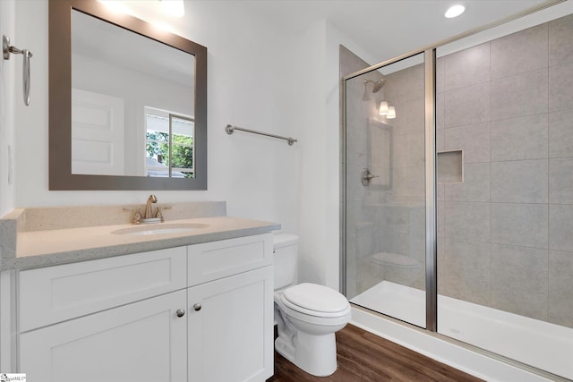 206 Daniels St, Anderson, SC 29625 - bathroom with toilet, wood finished floors, a stall shower, vanity, and recessed lighting
