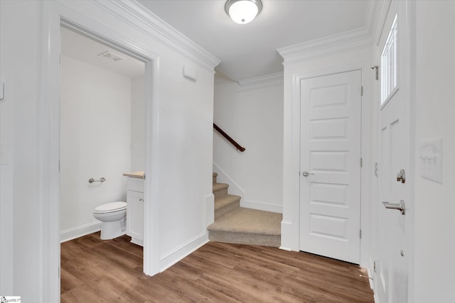 206 Daniels St, Anderson, SC 29625 - entrance foyer with ornamental molding, wood finished floors, stairs, and baseboards