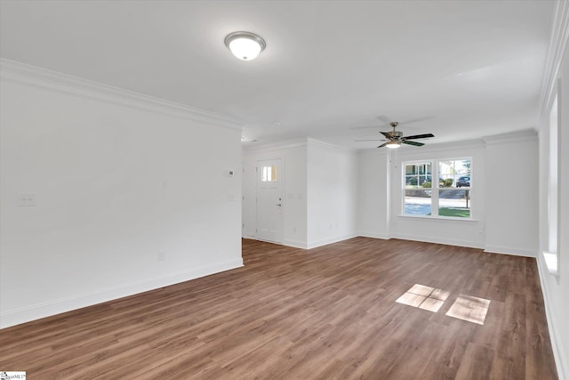 206 Daniels St, Anderson, SC 29625 - spare room with ornamental molding, baseboards, wood finished floors, and a ceiling fan