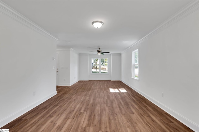 206 Daniels St, Anderson, SC 29625 - unfurnished living room with ceiling fan, crown molding, wood finished floors, and baseboards