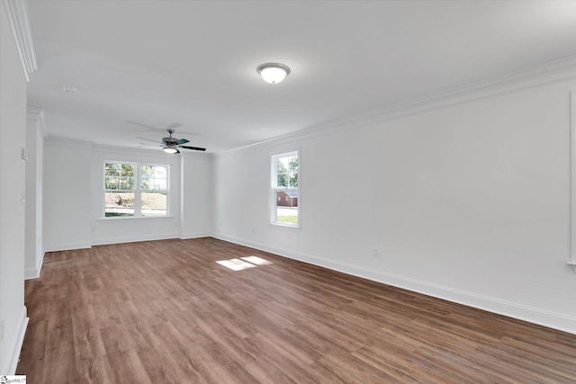 206 Daniels St, Anderson, SC 29625 - spare room with ornamental molding, wood finished floors, baseboards, and ceiling fan